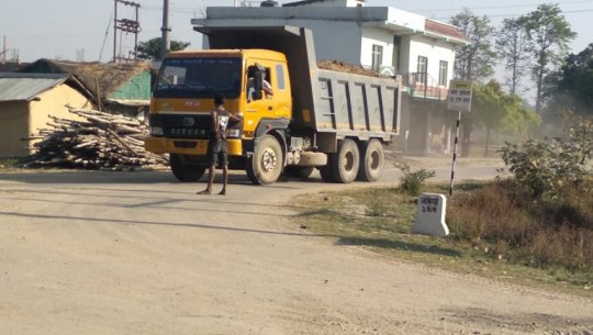 Locals protest on the road by stopping vehicles