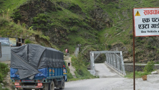 Guigad Khola bridge still non-operational after 15 years, locals face risky travel
