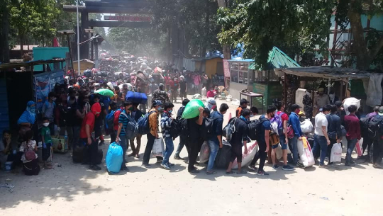 An influx of Nepalese worker stranded in India continues to return via Gaurifanta border