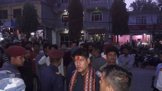 Youth of Doti waves a Black Flag